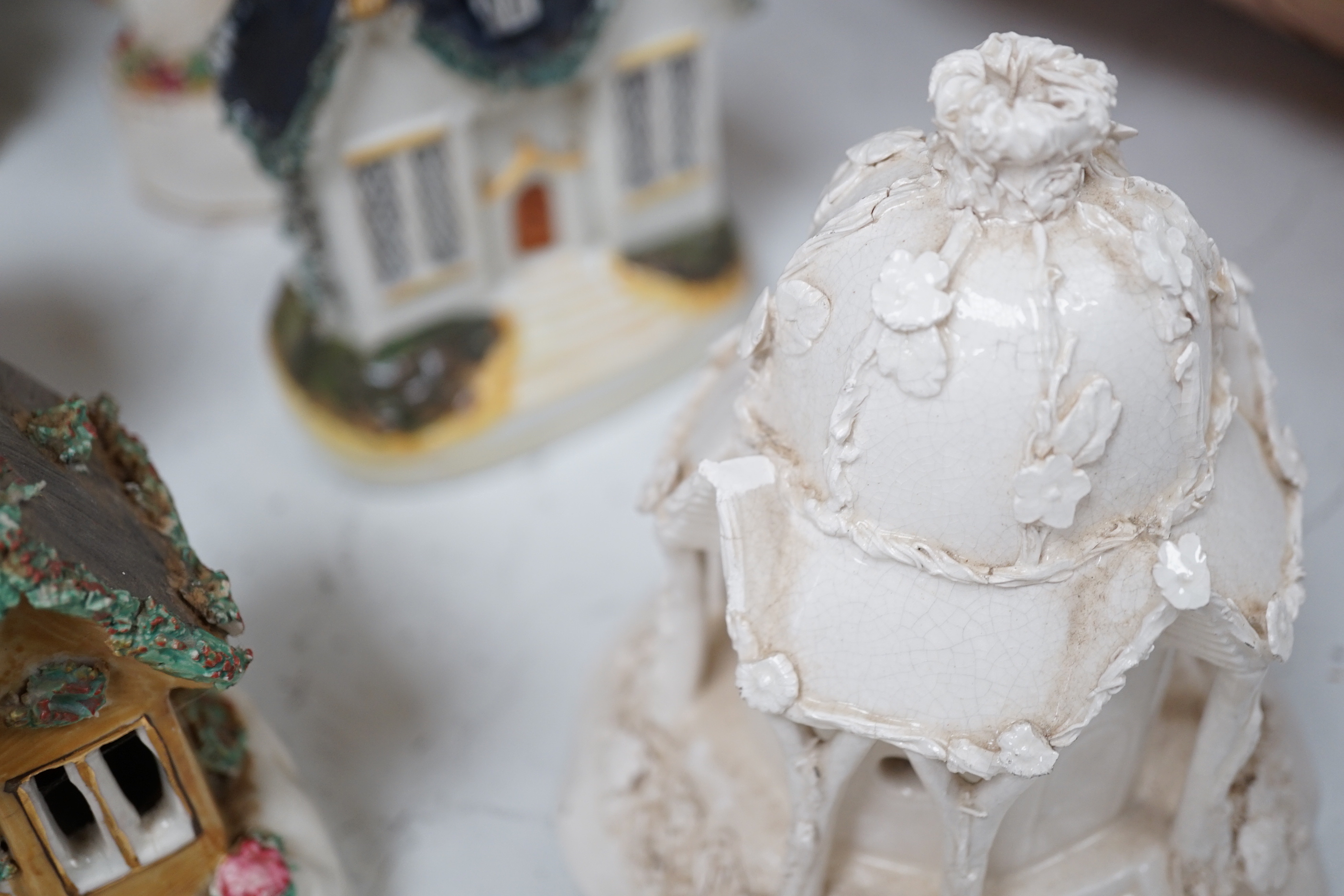 Thirteen Staffordshire 'cottage’ pastille burners or models
